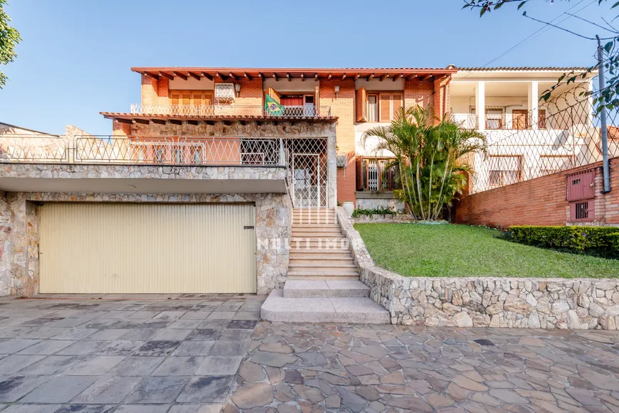 Foto 1 de Casa com 3 Quartos à venda, 408m² em Partenon, Porto Alegre