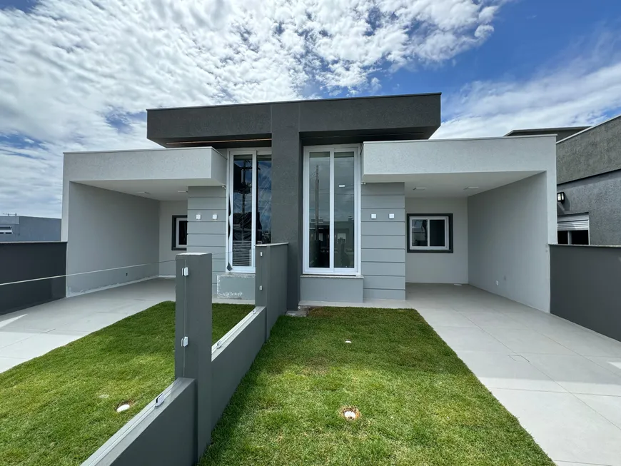 Foto 1 de Casa com 3 Quartos à venda, 89m² em Atlantida Sul, Osório