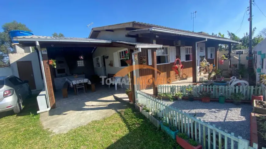 Foto 1 de Casa com 4 Quartos à venda, 121m² em Guaiuba, Imbituba