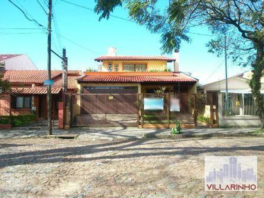 Foto 1 de Casa com 4 Quartos à venda, 200m² em Cavalhada, Porto Alegre