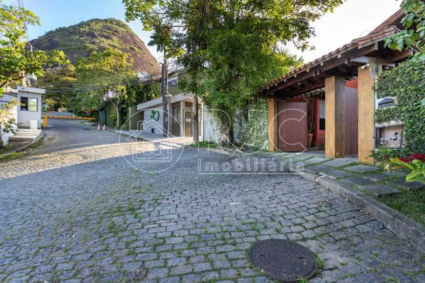 Foto 1 de Casa com 4 Quartos à venda, 392m² em Laranjeiras, Rio de Janeiro