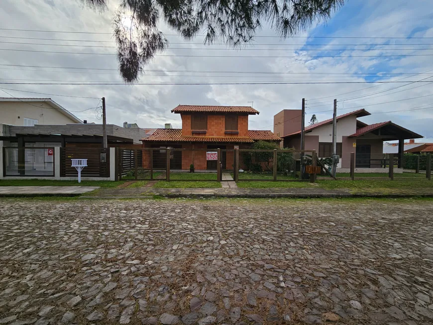 Foto 1 de Sobrado com 3 Quartos à venda, 116m² em Capao Novo, Capão da Canoa