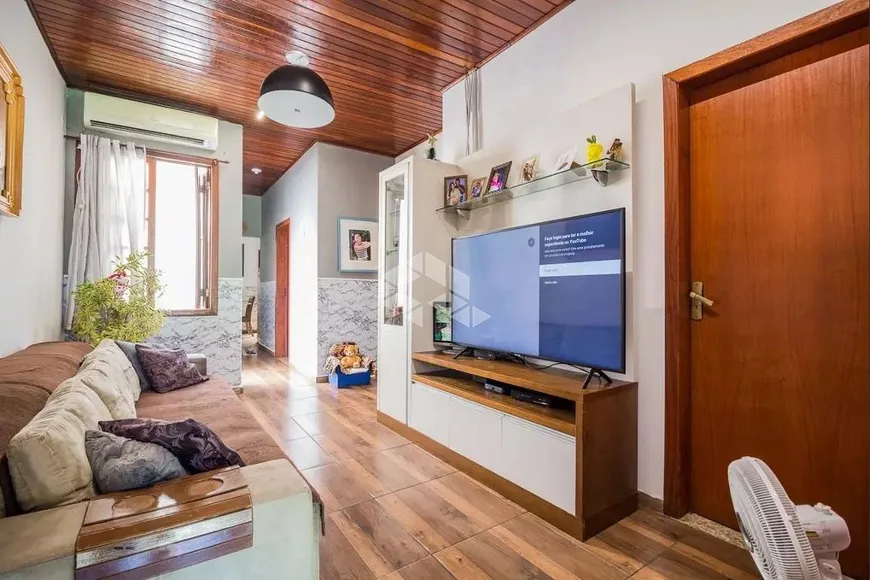 Foto 1 de Casa com 4 Quartos à venda, 120m² em Medianeira, Porto Alegre