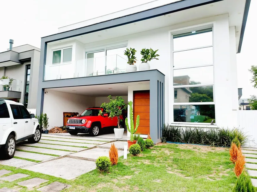 Foto 1 de Casa de Condomínio com 4 Quartos à venda, 259m² em São João do Rio Vermelho, Florianópolis