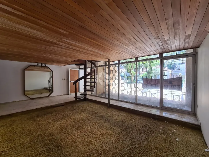 Foto 1 de Casa com 3 Quartos à venda, 350m² em Auxiliadora, Porto Alegre