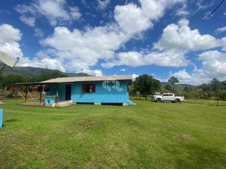 Foto 1 de Fazenda/Sítio com 2 Quartos à venda, 79470m² em Maquiné , Maquiné