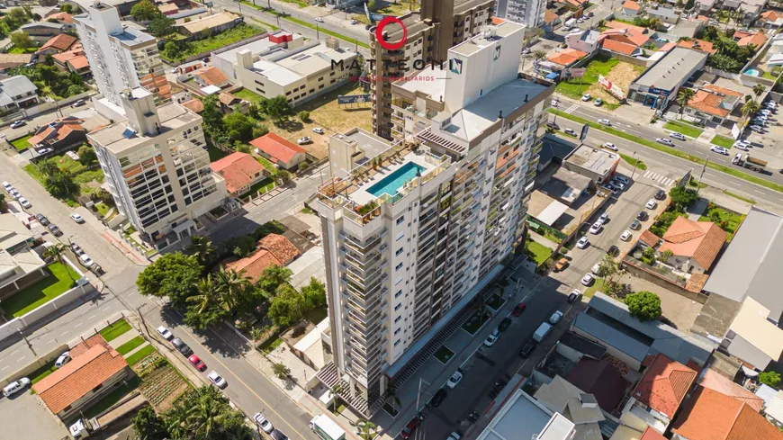 Foto 1 de Apartamento com 3 Quartos à venda, 104m² em Vila Moema, Tubarão