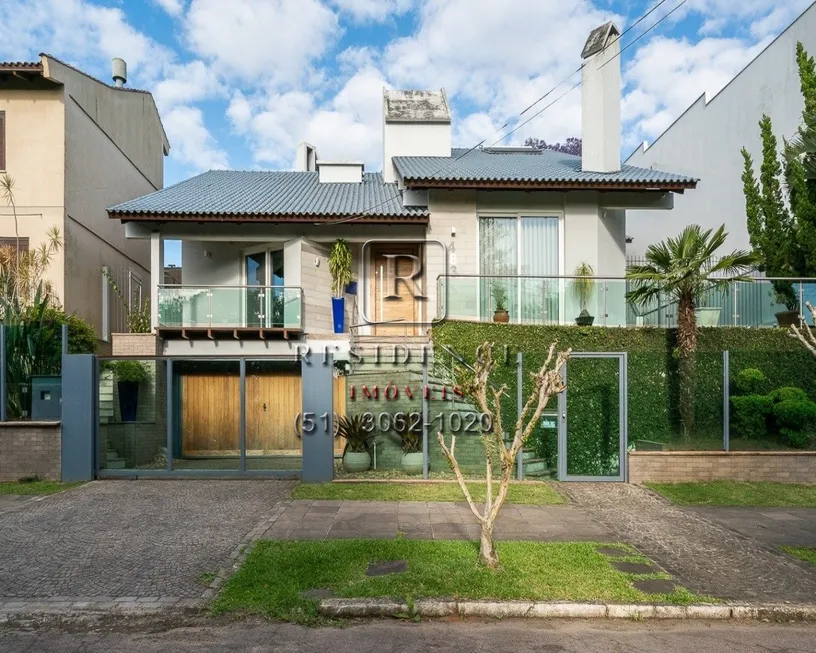 Foto 1 de Casa com 4 Quartos para venda ou aluguel, 484m² em Chácara das Pedras, Porto Alegre