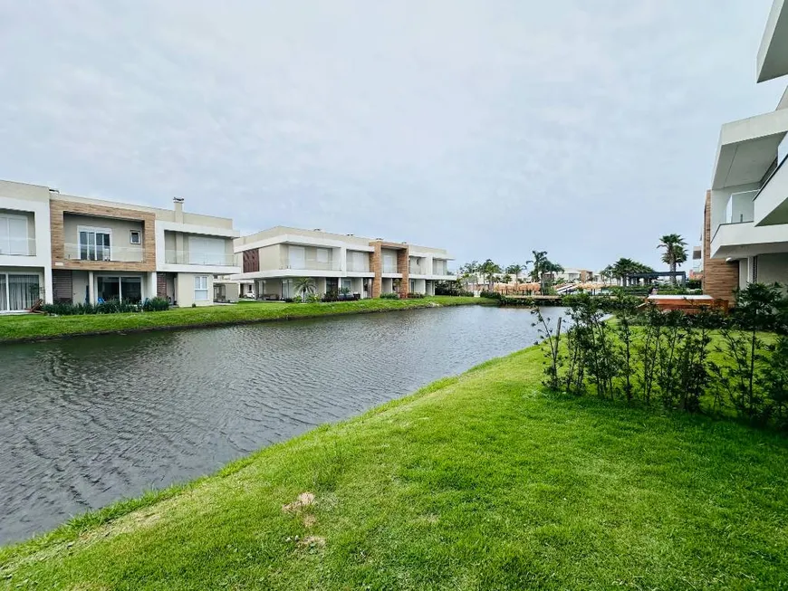 Foto 1 de Casa de Condomínio com 4 Quartos à venda, 144m² em Zona Nova, Capão da Canoa