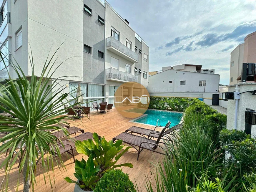 Foto 1 de Apartamento com 1 Quarto à venda, 59m² em Canasvieiras, Florianópolis