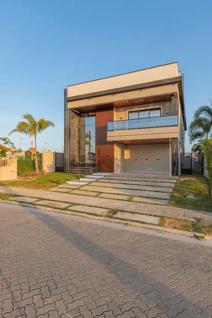 Foto 1 de Casa de Condomínio com 4 Quartos à venda, 363m² em Cidade Alpha, Eusébio