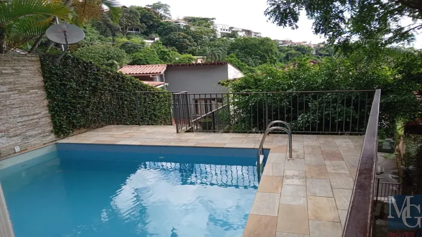 Foto 1 de Casa com 4 Quartos à venda, 327m² em Barra da Tijuca, Rio de Janeiro