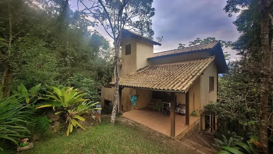 Foto 1 de Casa com 4 Quartos à venda, 170m² em Praia do Rosa, Imbituba