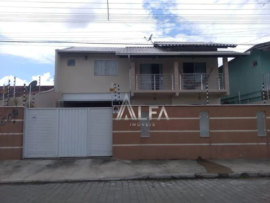 Foto 1 de Sobrado com 3 Quartos à venda, 180m² em Armação, Penha