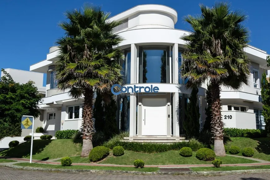 Foto 1 de Casa com 4 Quartos à venda, 470m² em Jurerê Internacional, Florianópolis