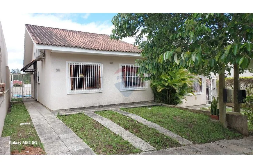 Foto 1 de Casa de Condomínio com 2 Quartos à venda, 80m² em Agronomia, Porto Alegre