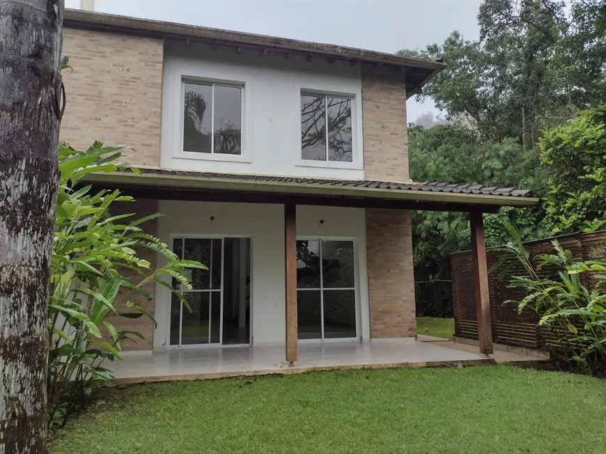 Foto 1 de Casa de Condomínio com 4 Quartos à venda, 156m² em Pauba, São Sebastião