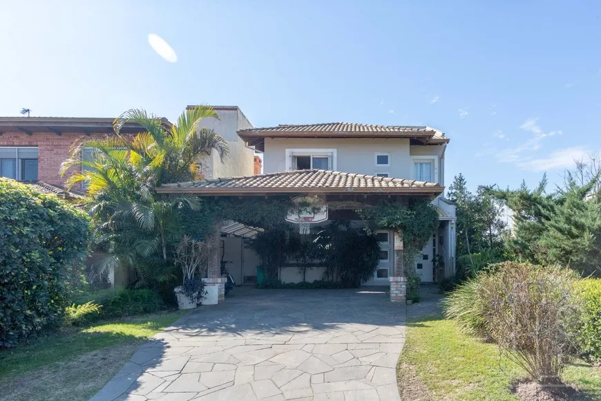 Foto 1 de Casa de Condomínio com 3 Quartos à venda, 239m² em Belém Novo, Porto Alegre