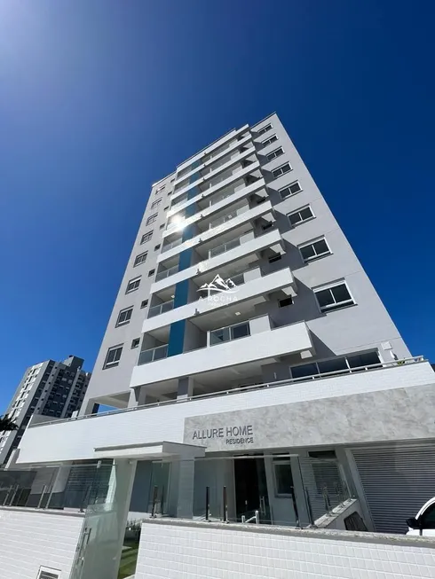 Foto 1 de Apartamento com 2 Quartos à venda, 76m² em Barreiros, São José