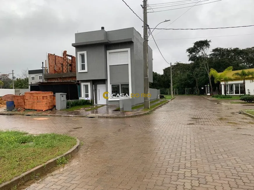 Foto 1 de Casa de Condomínio com 3 Quartos à venda, 125m² em Campo Novo, Porto Alegre