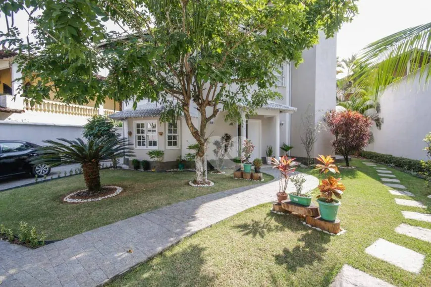 Foto 1 de Casa de Condomínio com 4 Quartos à venda, 438m² em Barra da Tijuca, Rio de Janeiro