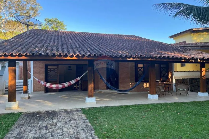 Foto 1 de Casa de Condomínio com 5 Quartos à venda, 256m² em Massaguaçu, Caraguatatuba