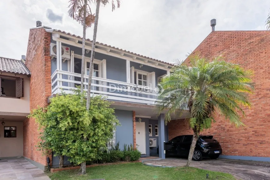 Foto 1 de Casa de Condomínio com 5 Quartos à venda, 216m² em Jardim Isabel, Porto Alegre