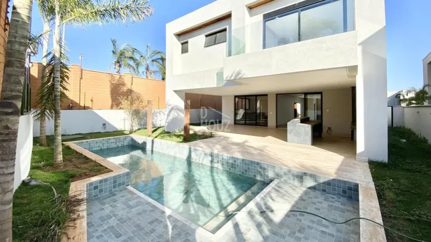 Foto 1 de Casa de Condomínio com 4 Quartos à venda, 455m² em Residencial Alphaville Flamboyant, Goiânia
