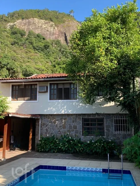 Foto 1 de Casa com 4 Quartos à venda, 320m² em Barra da Tijuca, Rio de Janeiro