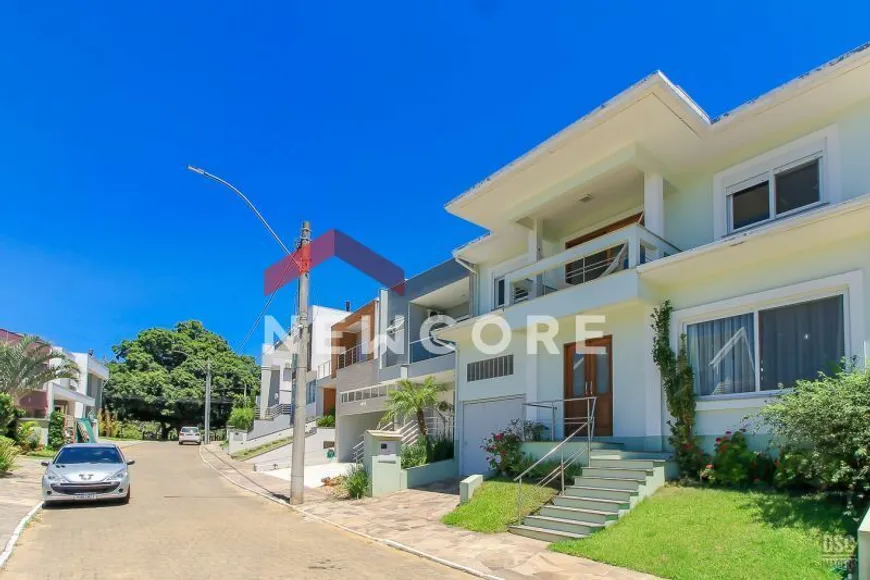 Foto 1 de Casa de Condomínio com 5 Quartos à venda, 270m² em Hípica, Porto Alegre
