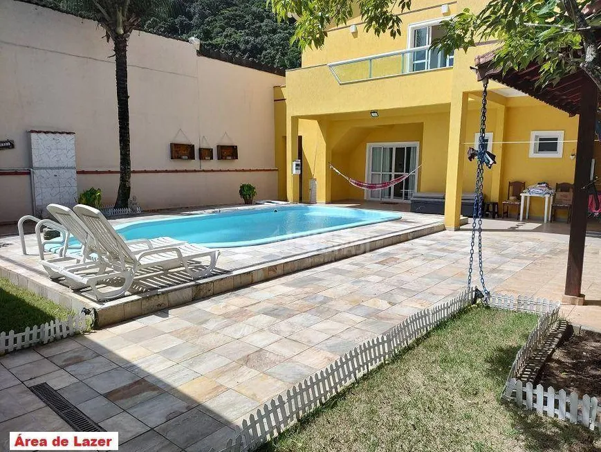 Foto 1 de Casa com 4 Quartos à venda, 286m² em Canto do Forte, Praia Grande