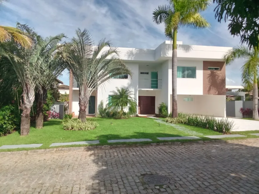 Foto 1 de Casa de Condomínio com 4 Quartos à venda, 385m² em Busca-Vida, Camaçari