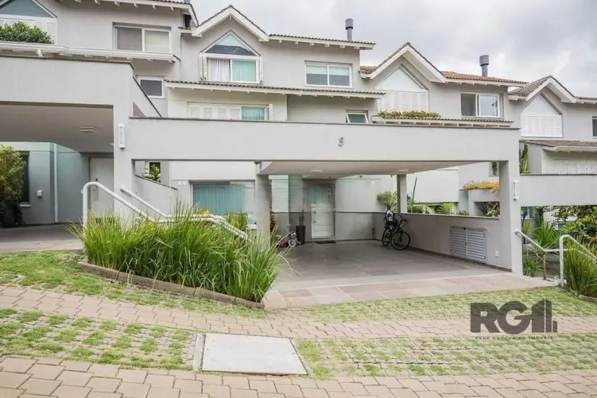 Foto 1 de Casa de Condomínio com 4 Quartos à venda, 323m² em Três Figueiras, Porto Alegre