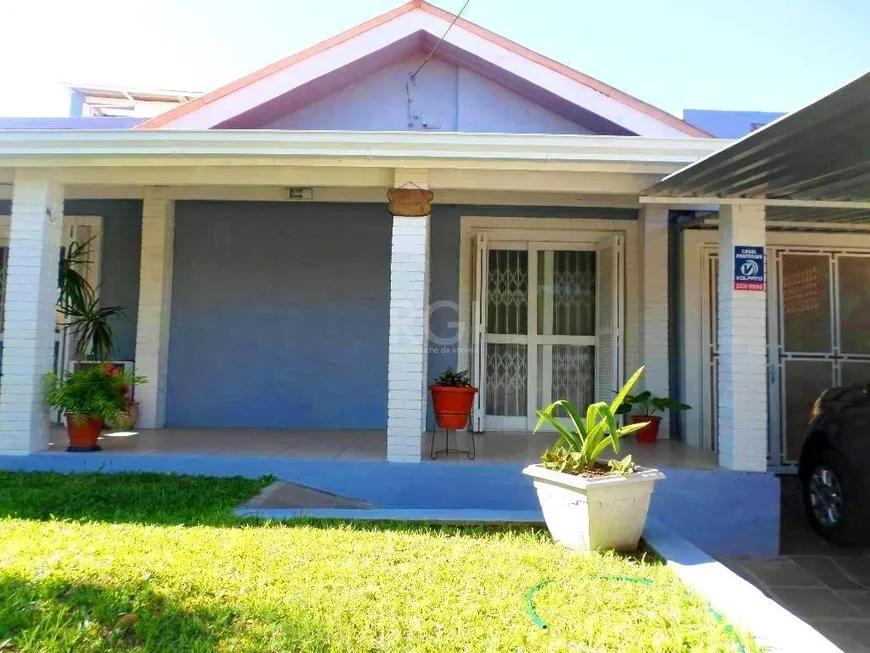 Foto 1 de Casa com 4 Quartos à venda, 289m² em Cavalhada, Porto Alegre