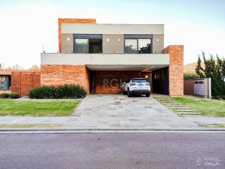 Foto 1 de Casa de Condomínio com 4 Quartos à venda, 478m² em Alphaville, Porto Alegre