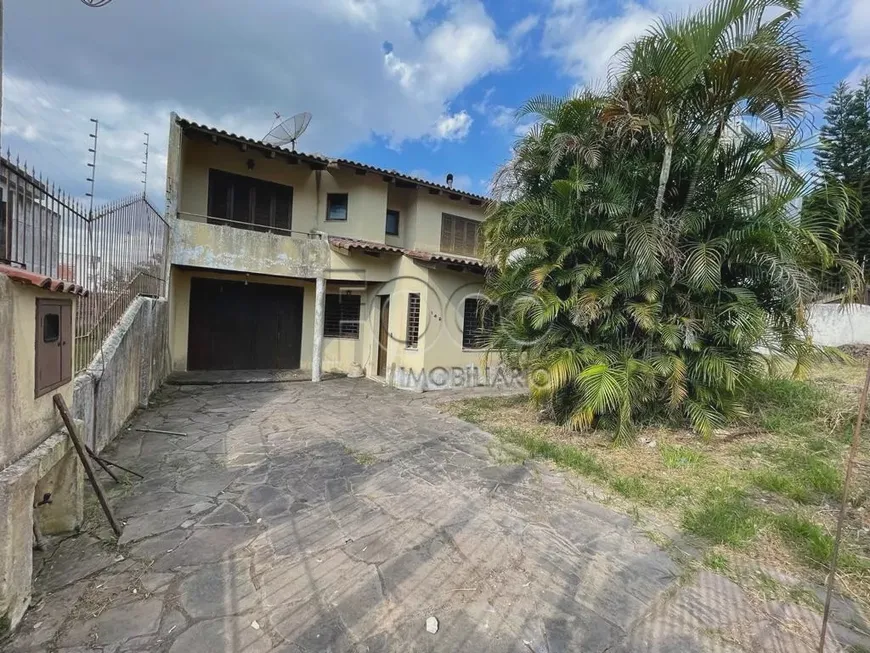 Foto 1 de Casa com 2 Quartos à venda, 400m² em Santa Tereza, Porto Alegre