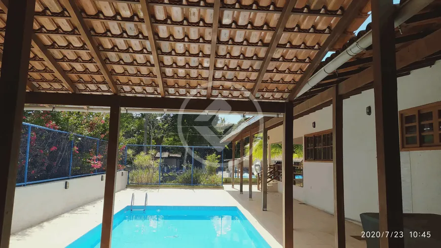 Foto 1 de Casa de Condomínio com 4 Quartos à venda, 340m² em Village do Sol, Guarapari