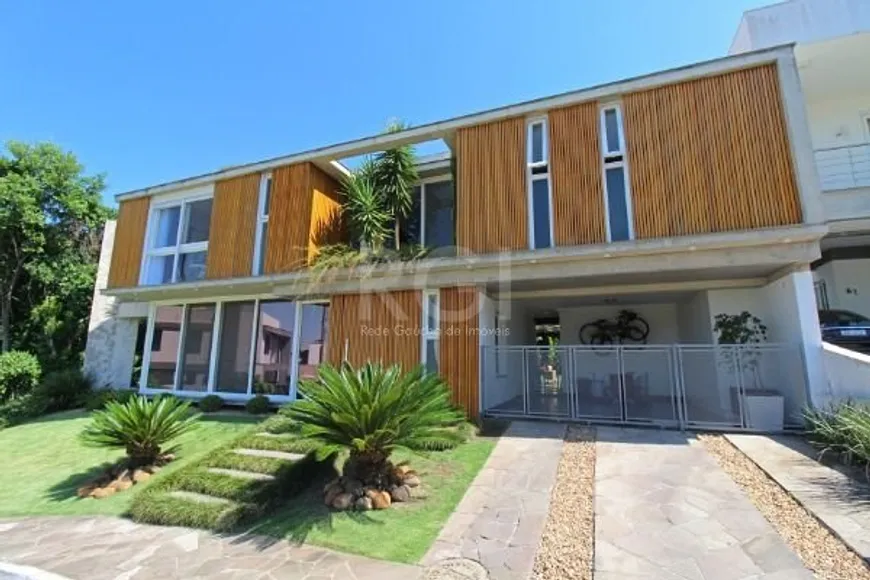 Foto 1 de Casa de Condomínio com 3 Quartos à venda, 278m² em Hípica, Porto Alegre
