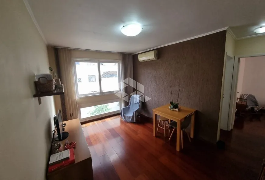 Foto 1 de Apartamento com 2 Quartos à venda, 53m² em Auxiliadora, Porto Alegre