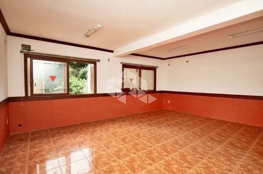 Foto 1 de Casa com 3 Quartos à venda, 258m² em Rio Branco, Porto Alegre