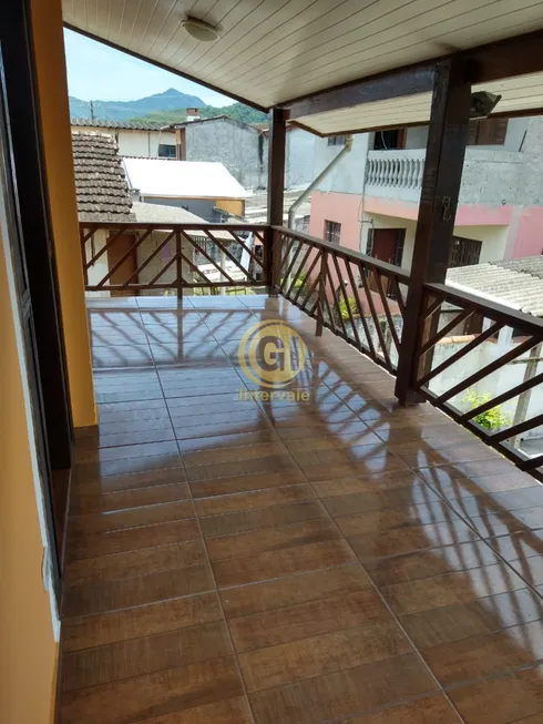 Foto 1 de Sobrado com 4 Quartos à venda, 212m² em Silop, Ubatuba