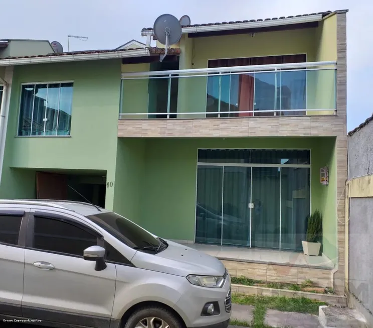 Foto 1 de Casa de Condomínio com 3 Quartos à venda, 126m² em Extensão do Bosque, Rio das Ostras