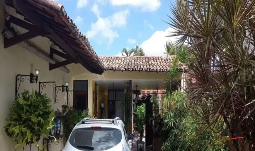 Foto 1 de Casa com 4 Quartos à venda, 129m² em Serrinha, Fortaleza