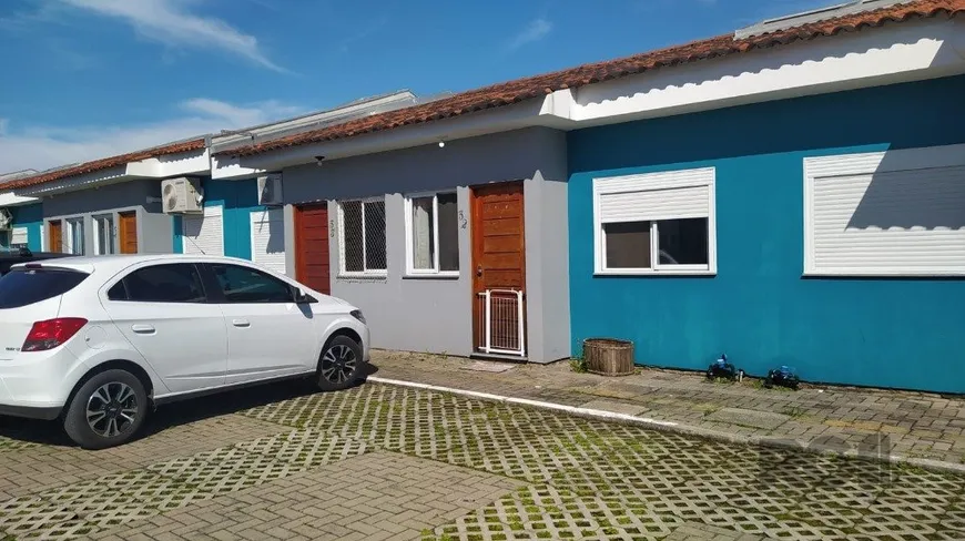 Foto 1 de Casa de Condomínio com 2 Quartos à venda, 45m² em Ponta Grossa, Porto Alegre