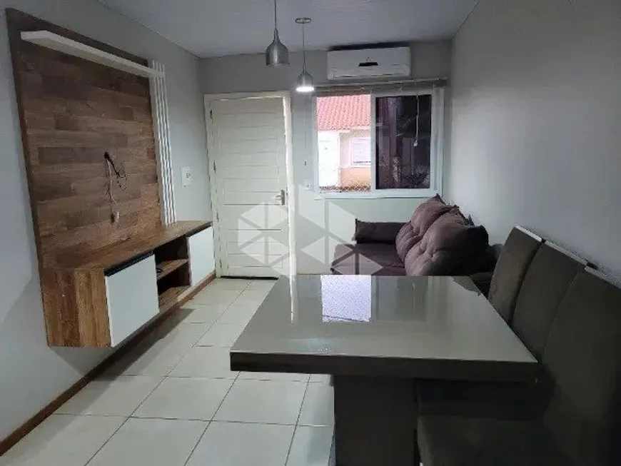 Foto 1 de Casa de Condomínio com 2 Quartos à venda, 67m² em Formoza, Alvorada