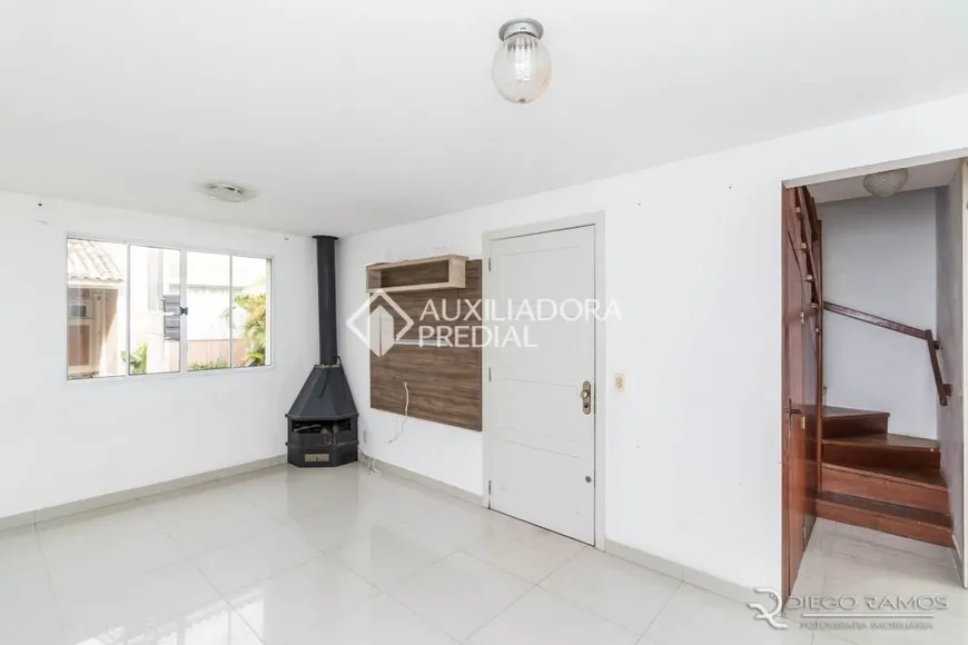 Foto 1 de Casa de Condomínio com 4 Quartos à venda, 105m² em Humaitá, Porto Alegre