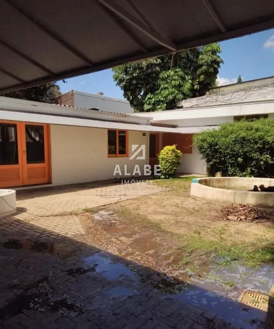 Foto 1 de Casa com 8 Quartos para venda ou aluguel, 417m² em Brooklin, São Paulo