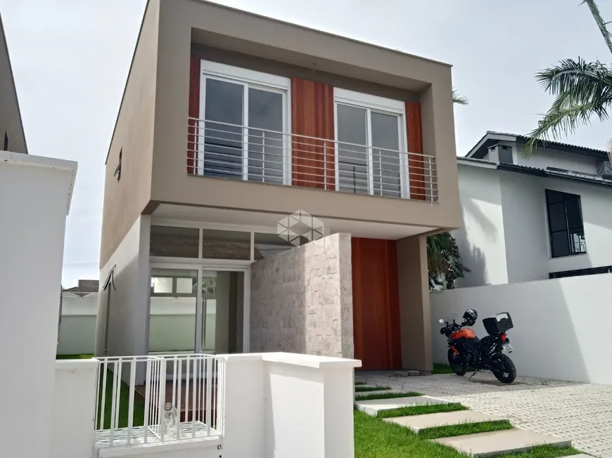 Foto 1 de Casa com 3 Quartos à venda, 194m² em Lagoa da Conceição, Florianópolis