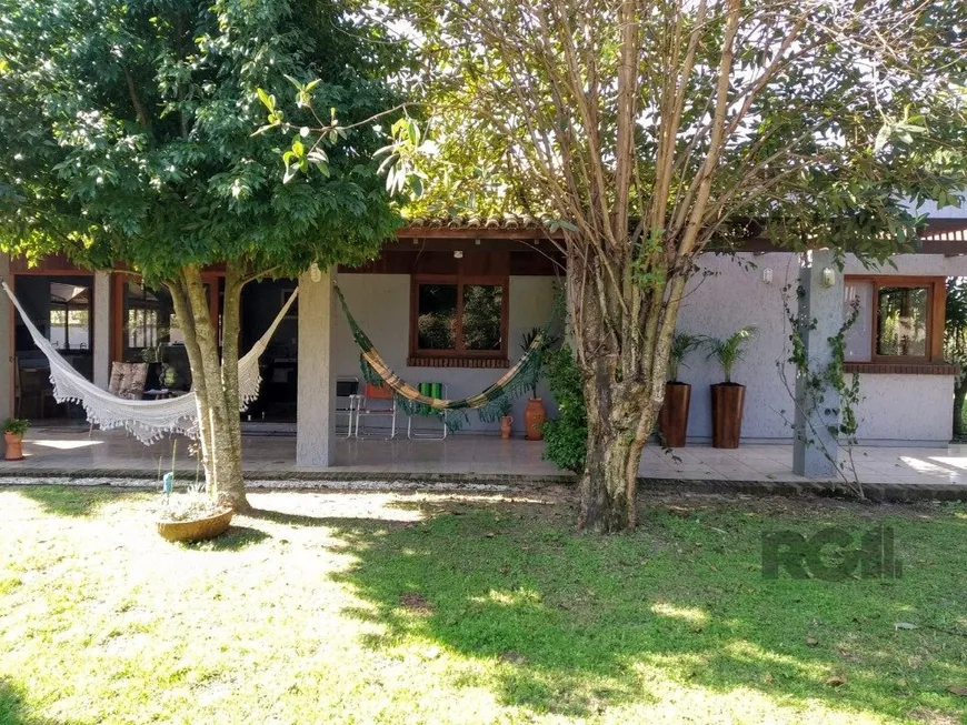 Foto 1 de Casa de Condomínio com 3 Quartos à venda, 219m² em Águas Claras, Viamão