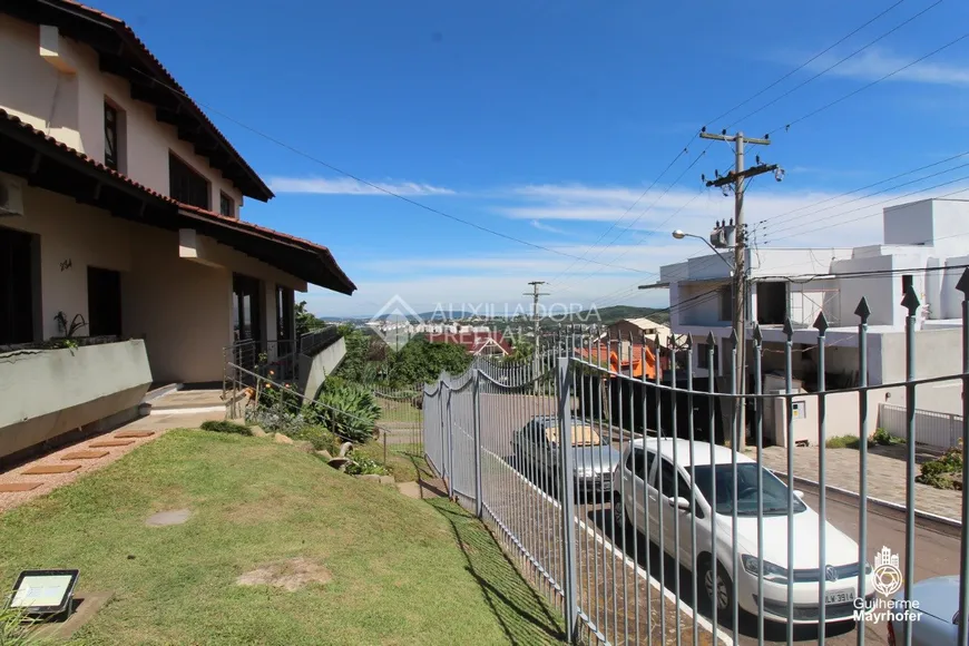 Foto 1 de Casa de Condomínio com 5 Quartos à venda, 433m² em Nonoai, Porto Alegre